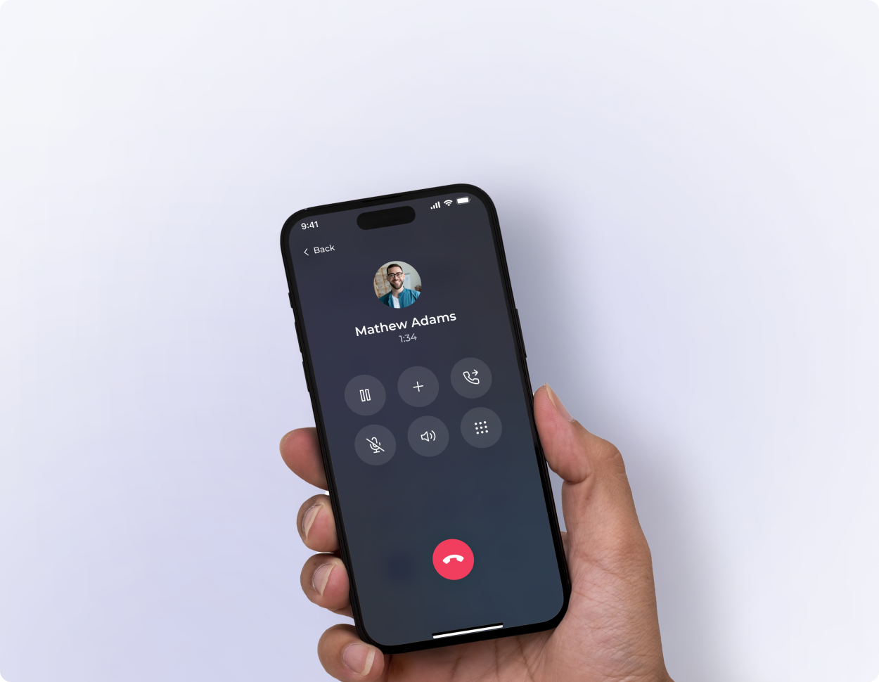 Hand holding smartphone displaying active call screen with Matthew Adams